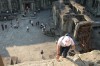 Laura climbing very steep steps at Angkor Wat
