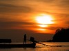 Long tailed boat at sunset. Ko Lipe, Thailand